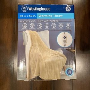 WESTINGHOUSE WARMING THROW NEW